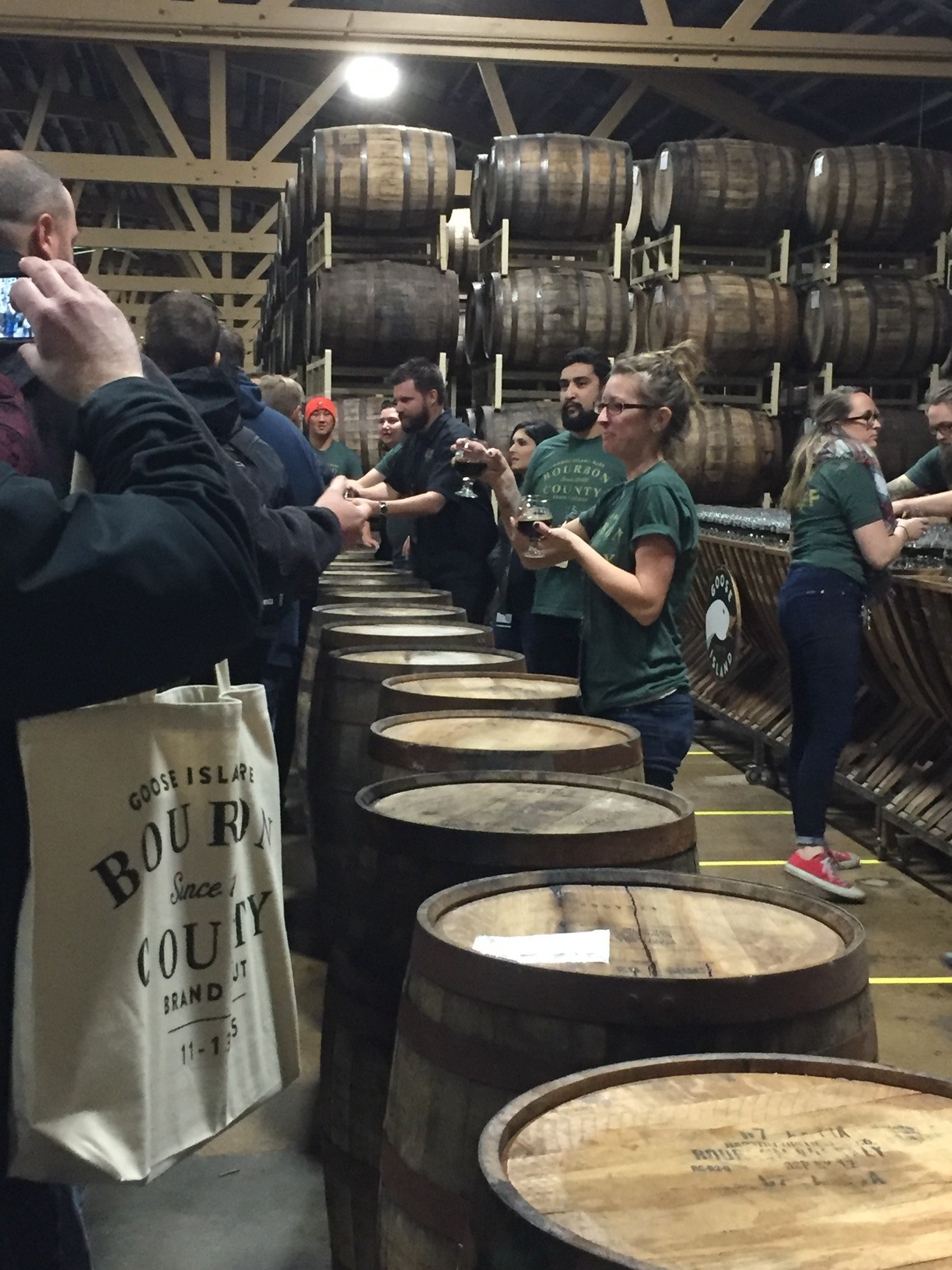 Goose Island employees hand out the Rare samples as people entered the Barrel House.