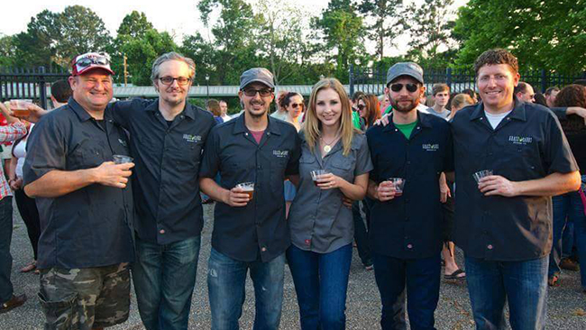 GrassLands Brewing Co. founders Gabe and Sara Grass, center, and the rest of the brewery crew. (Facebook)