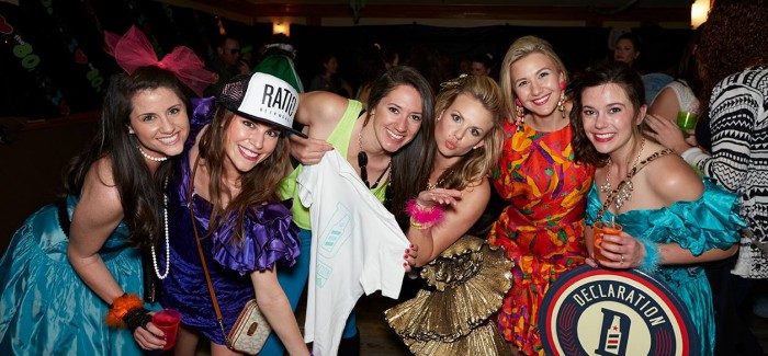 A group of women dressed in 80s themed outfits at the 2015 News Kids on the Block festival