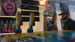 Featured beers, including the Pulled Porter, inside the SweetWater Experience Tent. (Chris Powell)