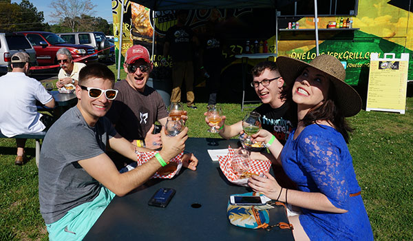 Friends eating together at a festival