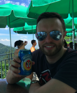 My husband and I grabbing a quick Antarctica at the top of Cristo Redentor.