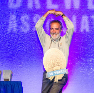 Charlie Papazian Self First Bumps for 35 Years. Photo © 2016 Jason E. Kaplan, DRAFT Magazine / Brewers Association Charlie Papazian Self Fist Bump