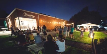 Eventide Brewing outside tables night