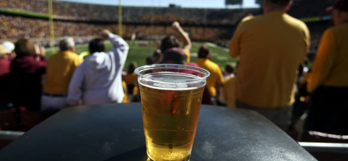 AP Photo/The Star Tribune, David Joles College Football Beer