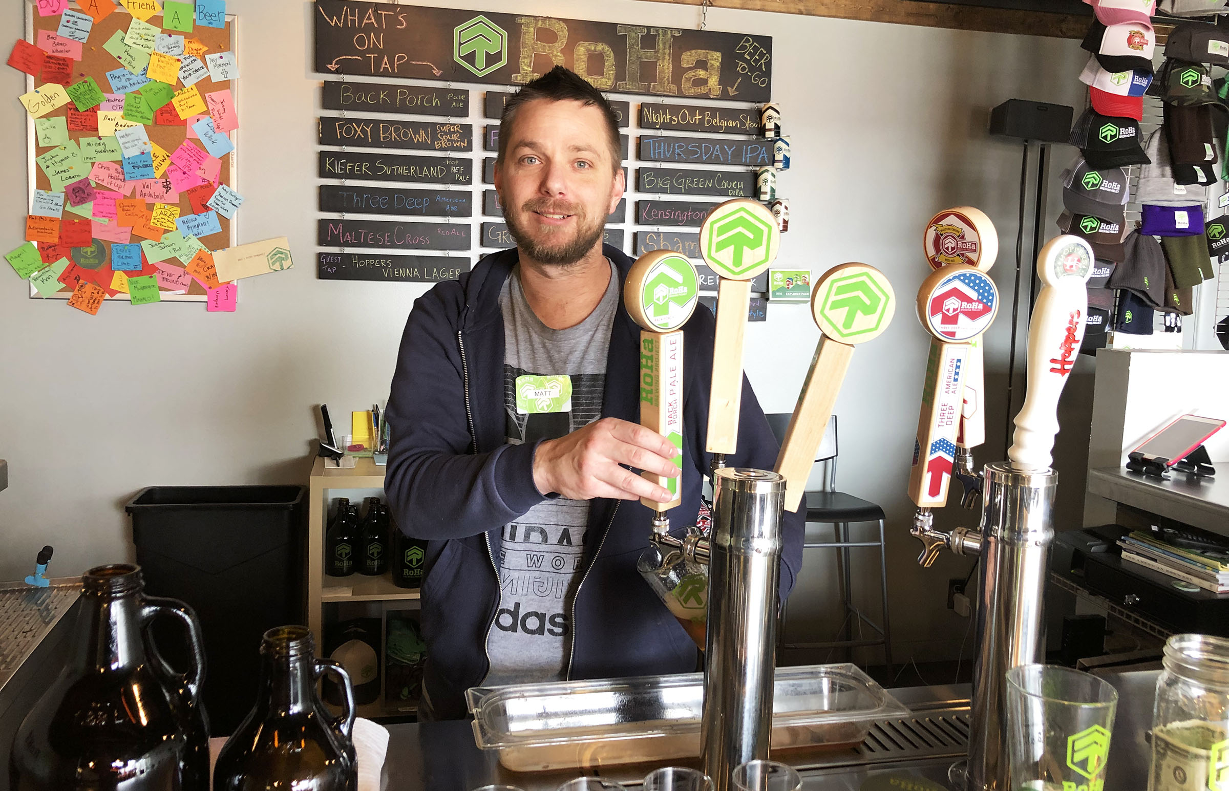 RoHa Brewing Project's Matthew Brown pours a pint during the brewery's Round Table Discussion series.