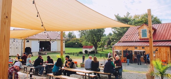 Patrons enjoying Wheatland Spring Farm + Brewery