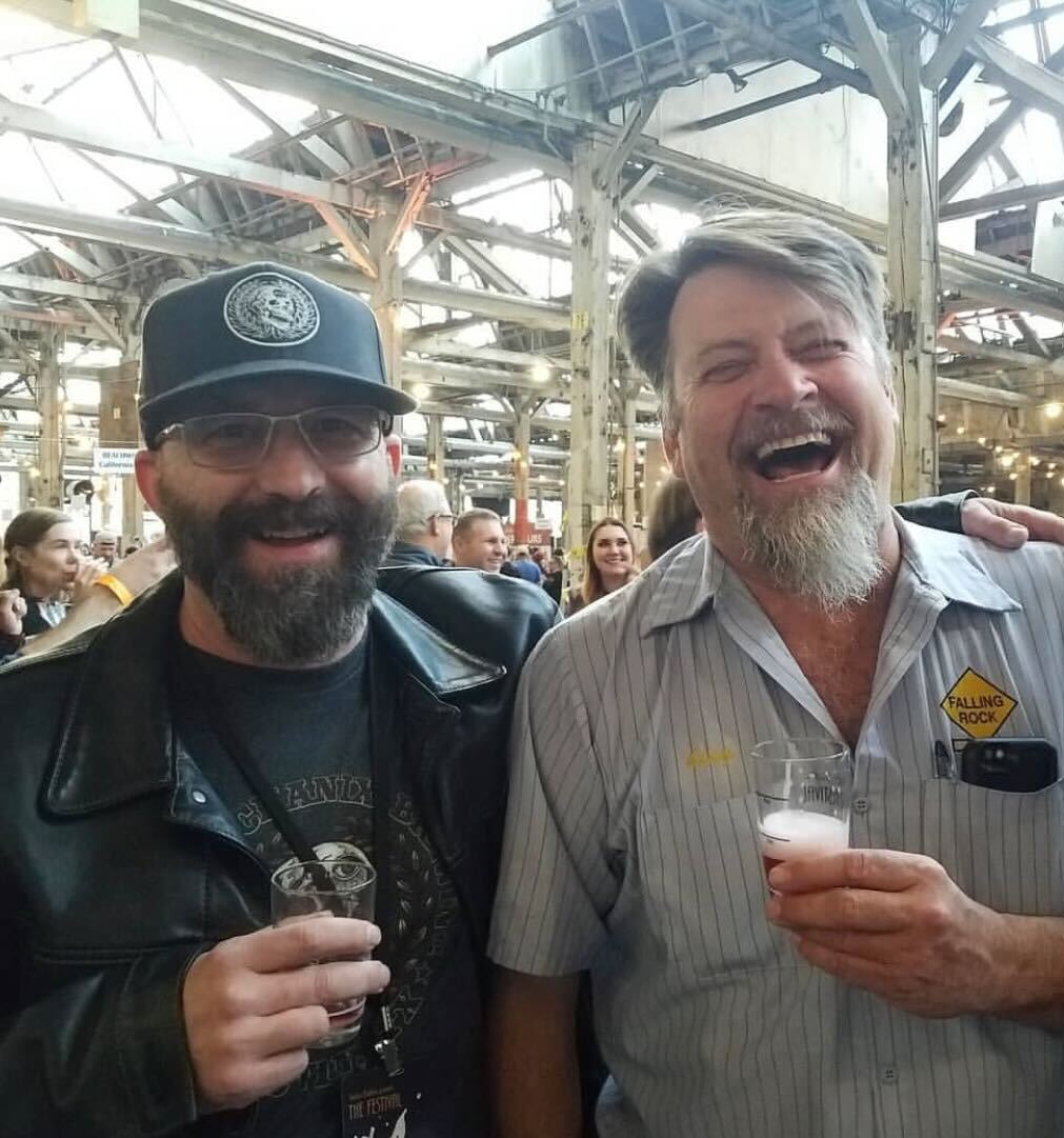 Chris Black of Falling Rock Tap House and Jeff Willis of Tap & Handle enjoying beer samples of beer festivals past.
