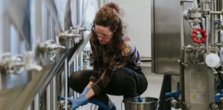 Student working in brewery