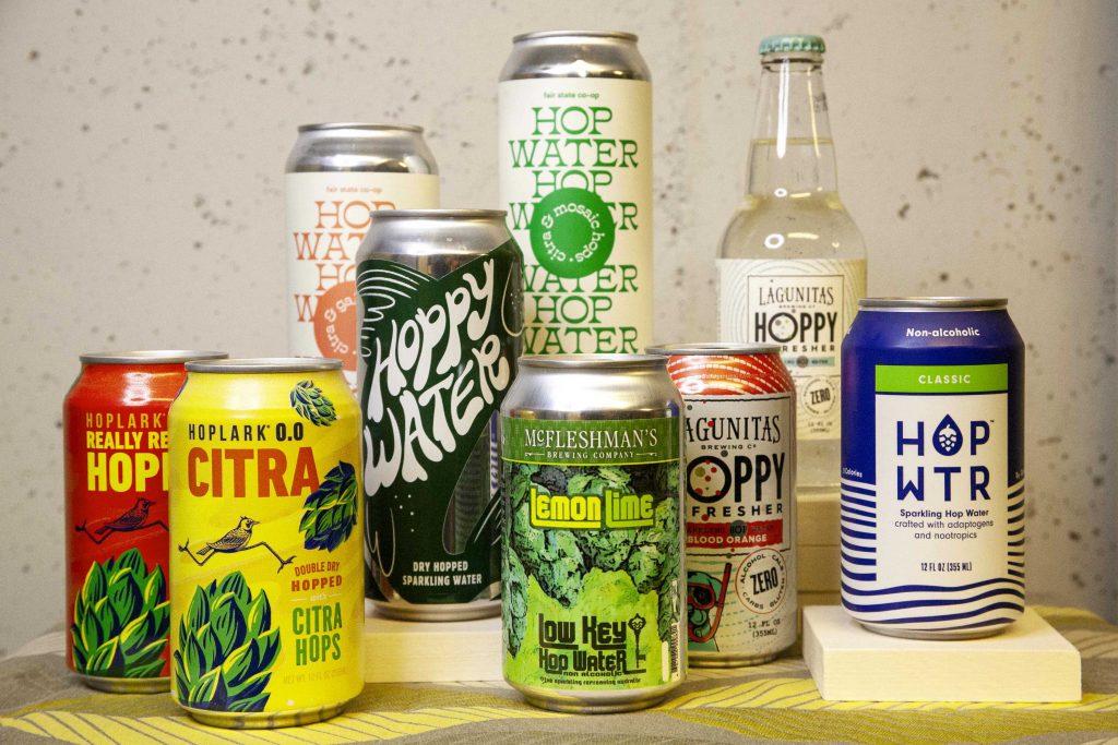 A colorful variety of hop water in cans and bottles