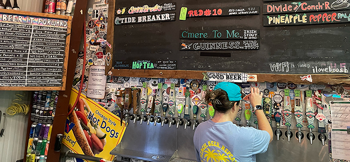 A beertender pours a pint at Idyll Hounds in Florida's Panhandle.